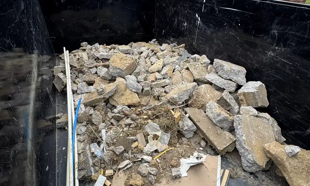 Broken concrete loaded into a dump trailer