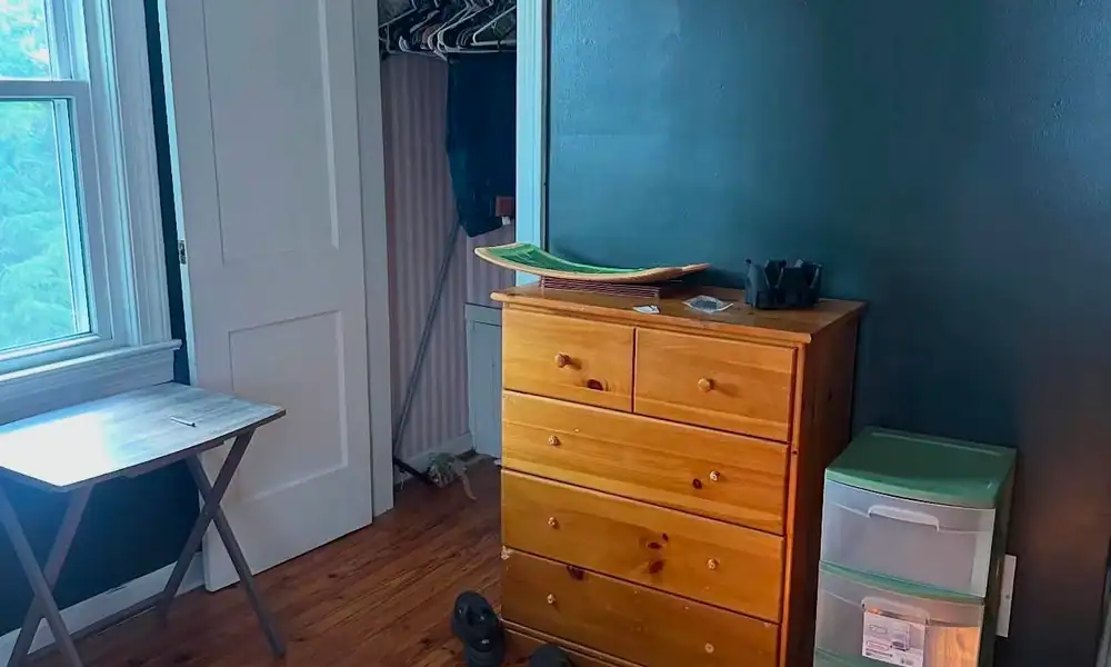 Bedroom with a dresser and storage drawers