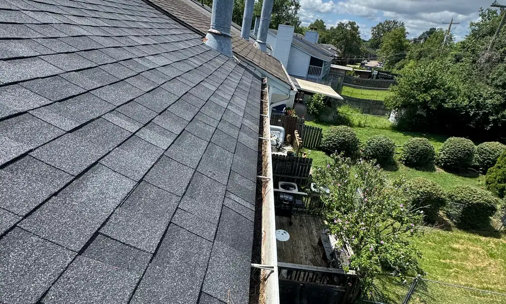 Asphalt shingle roof seen from the roofline